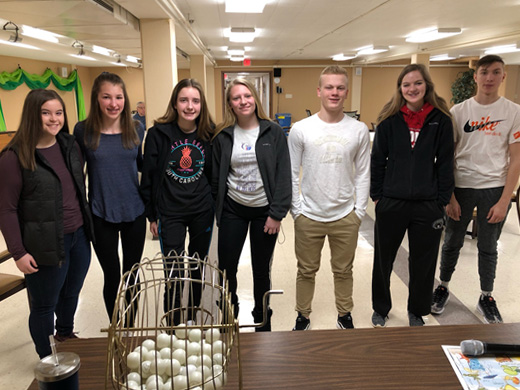 St. Louis Parish - 9th & 10th grade students volunteering at St. Monicas Photo Gallery